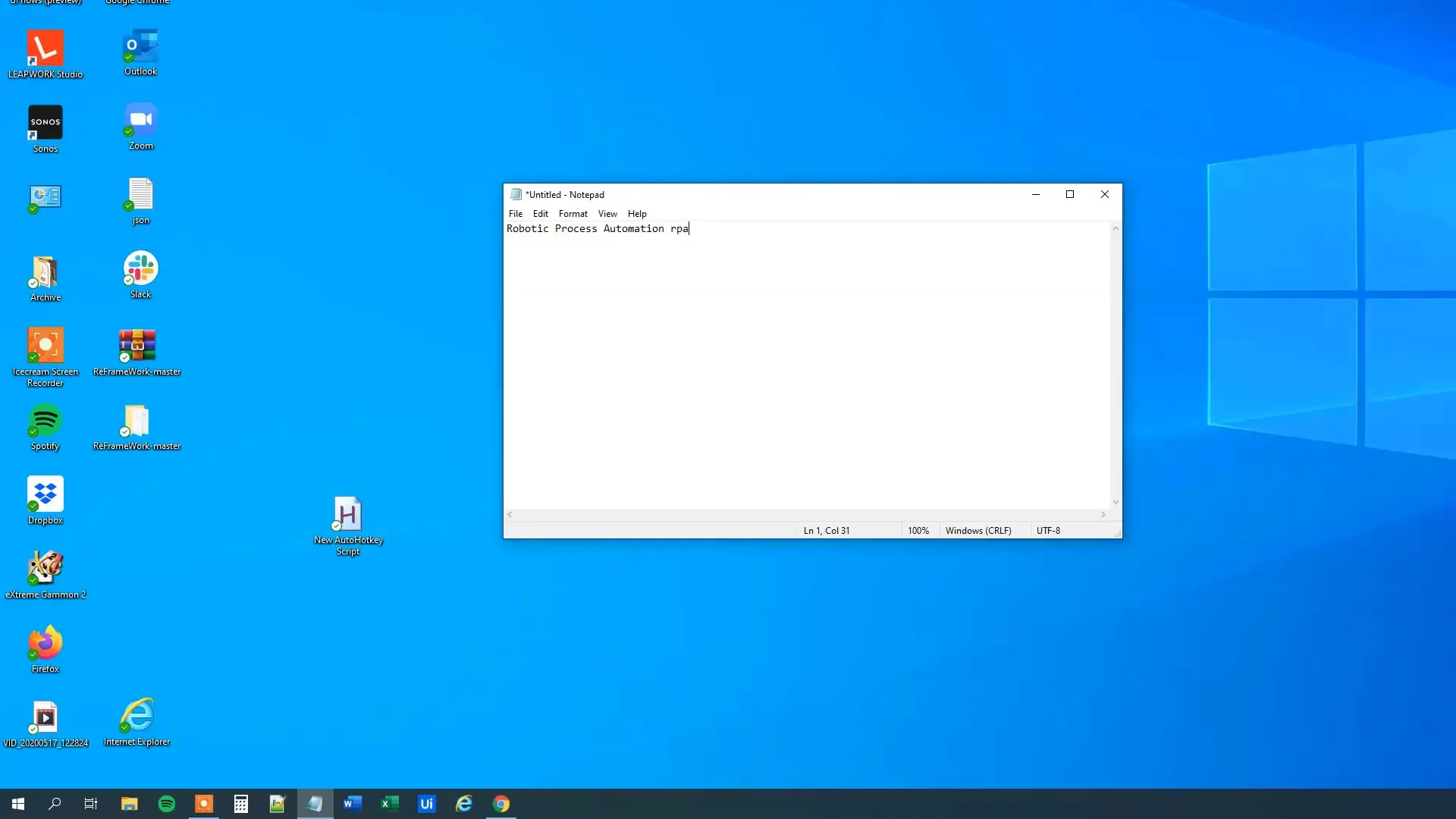 Testing the AutoHotkey script in Notepad showing text expansion in action